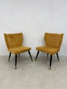 A pair of retro style side chairs on ebonised splay supports. H.82cm