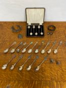A mixed collection of silver and white metal to include a set of English hallmarked coffee bean