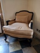 A large Louis XV style armchair in ebonised frame and piped damask upholstery. H.97 W.80cm. **