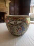 A Chinese Famille Rose goldfish bowl with all-over hand painted decoration. Dia.32cm. ** Please note