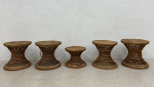 A matched set of five vintage rattan diabolo style stools. H.38 Dia.39cm
