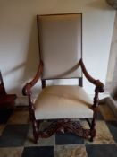 A late 19th century carved walnut framed armchair in studded leather upholstery. H.120cm. **