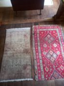 An Eastern carpet along with a Kazak rug, cut from a runner. 200x120cm (largest). ** Please note