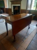 A Georgian mahogany single leaf drop flap table with gateleg action on slender cabriole ball and