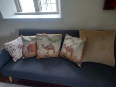 Three Eastern themed figural needlework cushions along with two others. 52x52cm largest. ** Please