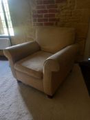 A 20th century armchair having a square back and scrolled arms over a chenille upholstered cushioned