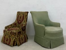 A damask upholstered nursing chair in the 19th century style having a scrolled back and shaped