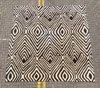 A hand-knotted pure wool carpet by The Rug Company, designed by renowned British fashion