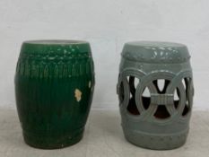 Two Oriental ceramic garden stools to include one with moulded decoration in an Imperial green glaze
