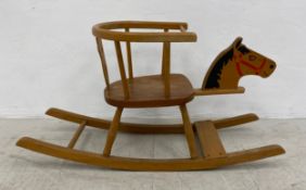 A vintage child's rocking horse. 45x84x30cm