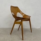 A mid-century C2 Jason dining chair by Carl Jacobs for Kandya having a bent ply openwork back and