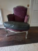 A vintage fauteuil armchair in the French 19th century style having a shaped purple damask