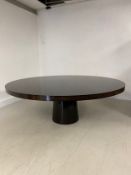 A circular dining table by Davidson’s of London, the celebrated British maker of bespoke luxury