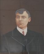 A 20th century mixed media portrait of a young man in a glazed gilt frame. H.55 W.45cm