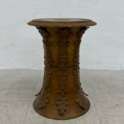 A vintage painted metal pedestal or jardiniere stand having a removable circular top over a shaped