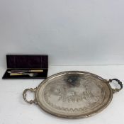 A large silver plated twin handled tray and a pair of 19th century silver plated fish servers. L.