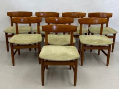 A set of eight mid century teak Karl Andersson dining chairs in original upholstery with maker's