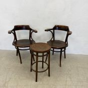 A pair of Mundus and J & J Kohn bentwood armchairs and a Polish Bentwood Furniture Industry stool,