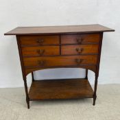An Arts and Crafts walnut side cabinet with an arrangement of four short drawers over a single