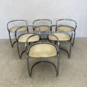 A set of six mid-century dining chairs on tubular metal bases. H.68cmairs H.68cm (Some with marks to