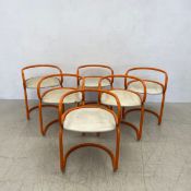 A set of six mid-century dining chairs on tubular metal bases. H.68cm