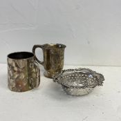 An English hallmarked silver tankard and a similar pierced dish along with a continental silver