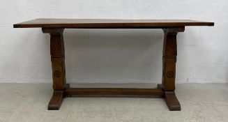 An early 20th century oak refectory dining table in the antique style with planked top and cleated