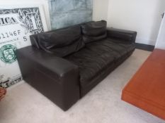 A vintage black leather three seater sofa. L.204 D.97cm