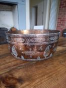 A possibly 19th century hand formed tinned-copper Persian bowl engraved with geometric lozenge