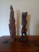 Two carved African tribal hardwood figures. H.41cm