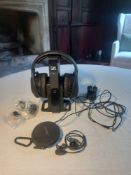 A pair of Sennheiser TR165 earphones and Bose similar.