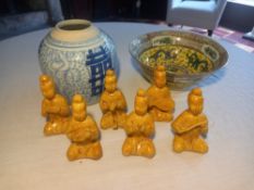 A Chinese Famille Jaune bowl, a blue and white ginger jar and a set of six musician figures. Dia.
