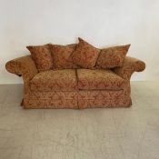 A contemporary two seater sofa. W.210cm