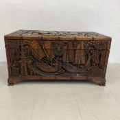 A vintage Chinese carved camphorwood lidded trunk. L.84 D.42 H.44cm
