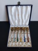 A set of six Danish gilt .925 sterling silver demitasse spoons with colourfully enamelled handles in