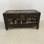 A Chinese carved camphorwood coffer with figural inlay to front, top and back fitted with lift-out