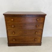 A 19th century mahogany chest of four long drawers on plinth base. H.107 W.117 D.50cm.