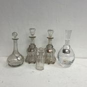 A pair of Georgian decanters and stoppers along with other decanters and glass to include a set of