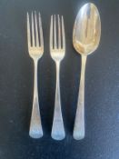 A pair of Georgian silver forks, Thomas Wallis, London 1799 and a Georgian silver spoon, London