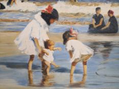 A contemporary oil on canvas, children playing on a beach, signed G. Raffaele to the lower left in a