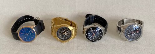 Four gents watches to include Emporio Armani, Jacques Lemans Formula 1, Swatch and Aviator.