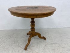 A 19th century Italian Sorrento inlaid centre table having a circular top over a single frieze