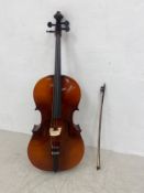 A 20th century Czechoslovakian model 400 cello by Boosey & Hawkes with bow in a soft case. H.126cm