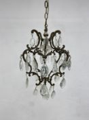 A small 19th century French brass and cut crystal chandelier. 83x35cm