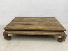 A contemporary Oriental elm opium or coffee table by Lombok with maker's plaque. H.41 D.90 W.161cm