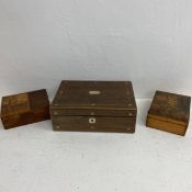 A 19th century rosewood writing slope with inset brass handles along with two other boxes. L.36cm (