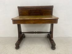 A C.1840 rosewood desk or writing table with raised superstructure fitted with drawers and a