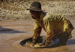 A contemporary large format photograph titled 'Artisanal Diamond Miner, Cempaka, Kalimantan,
