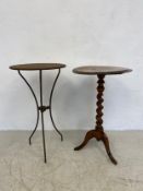 A small vintage cast iron bistro style table along with a Victorian marquetry inlaid mahogany