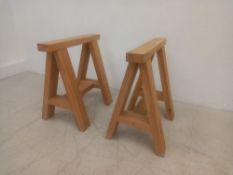 A pair of contemporary heavy oak a-frame trestle supports. H.65 D.65cm